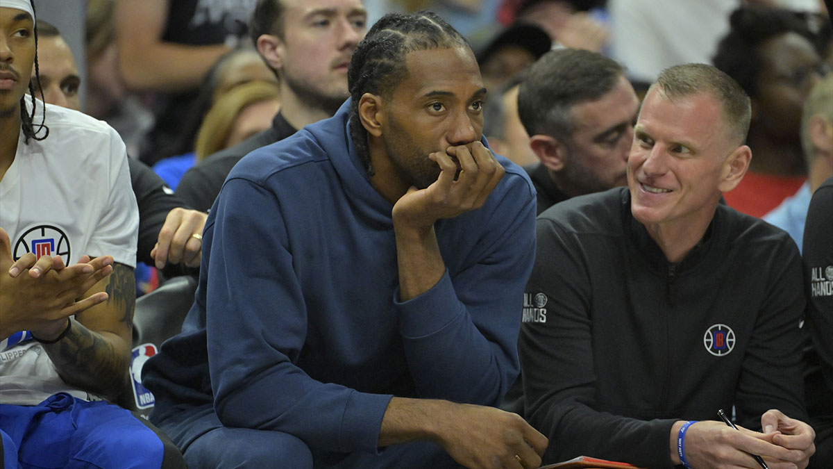 Los Angeles Clippers forward Kawhi Leonard (2) looks on from the bench during game one of the first round for the 2024 NBA playoffs against the Dallas Mavericks at Crypto.com Arena.