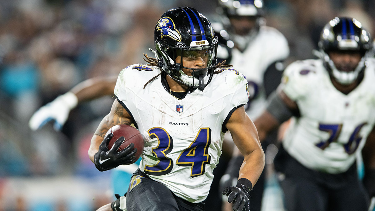 Jacksonville, Florida, USA; Baltimore Ravens running back Keaton Mitchell (34) runs the ball against the Jacksonville Jaguars in the fourth quarter at EverBank Stadium.