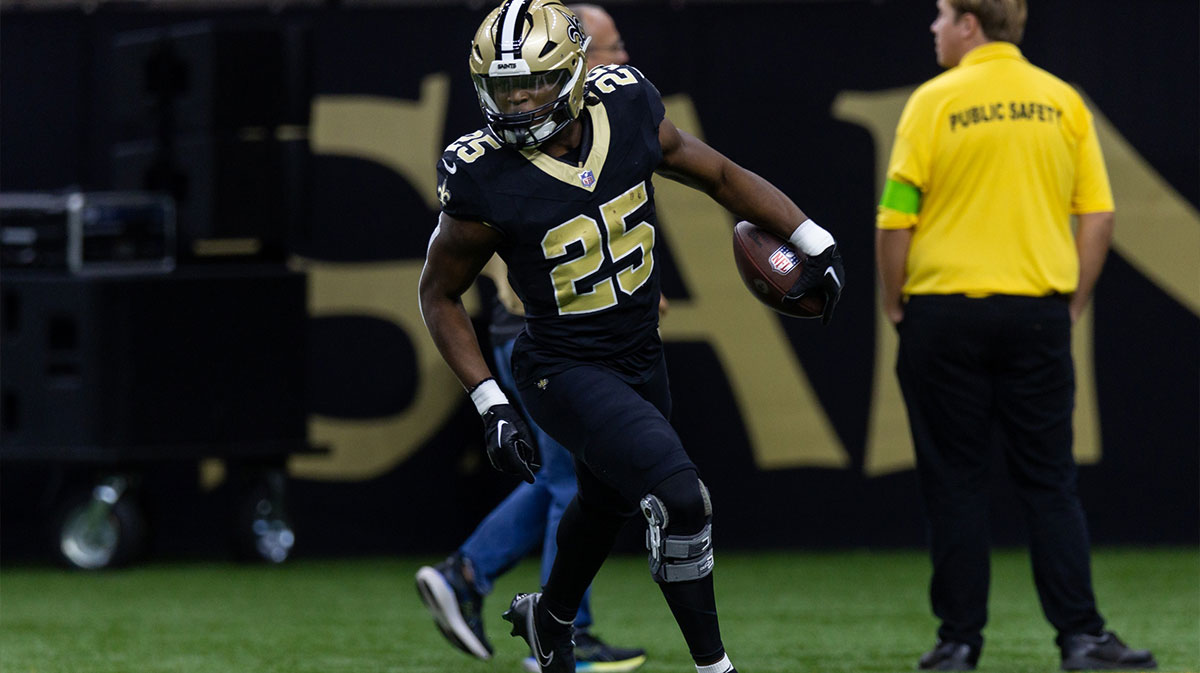 New Orleans Saints running back Kendre Miller (25) rushes against the Chicago Bears during the second half at the Caesars Superdome.