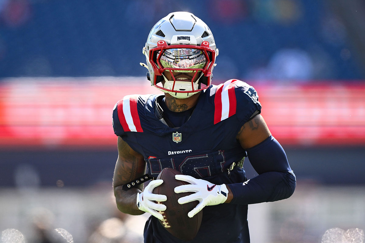 New England Patriots wide receiver Kendrick Bourne (84) runs with the ball before a game against the Miami Dolphins at Gillette Stadium.