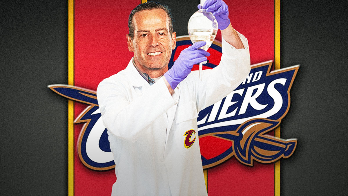 Kenny Atkinson as a mad scientist with a Cavs-themed BG.