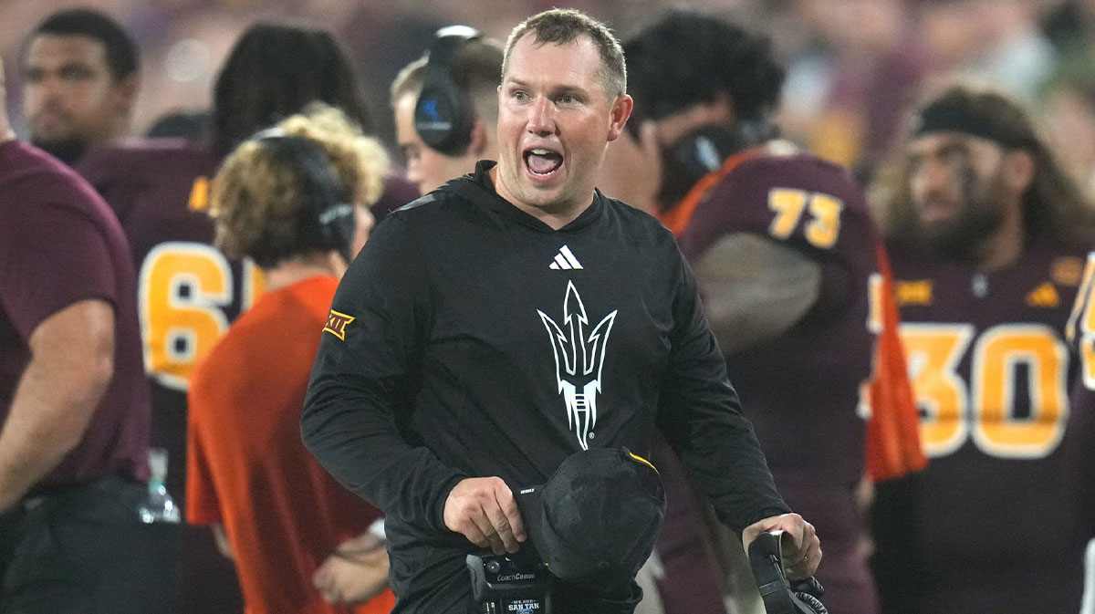 Arizona State head coach Kenny Dillingham yells out to his team from the sidelines during a game against the Kansas Jayhawks