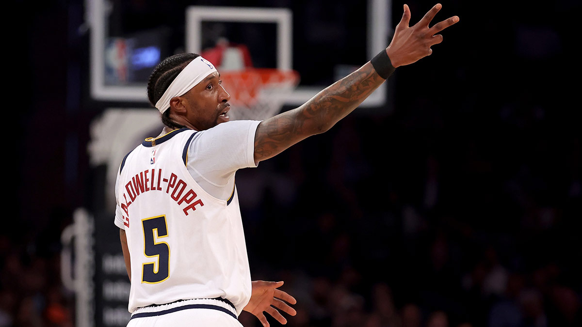 Denver Nuggets guard Kentavious Caldwell-Pope (5) celebrates his three point shot against the New York Knicks during the first quarter at Madison Square Garden.
