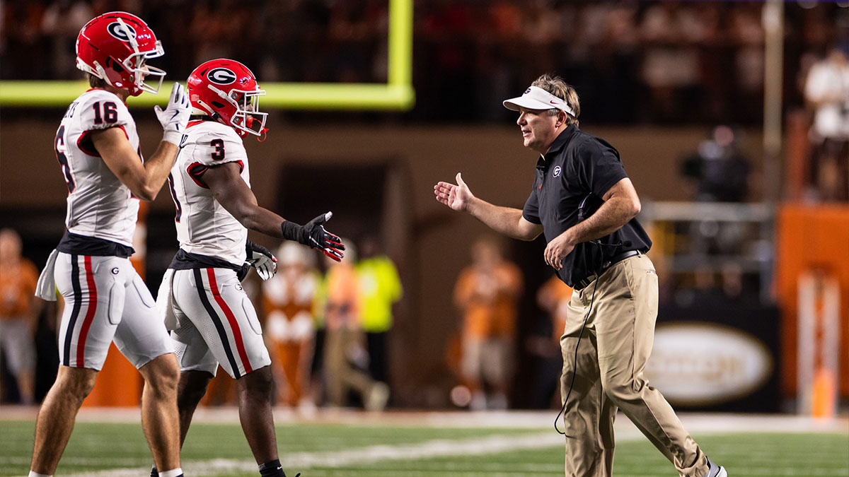 Georgia Bulldogs head coach Kirby Smart celebrates with his players during the second quarter against the Texas Longhorns at Darrell K Royal-Texas Memorial Stadium