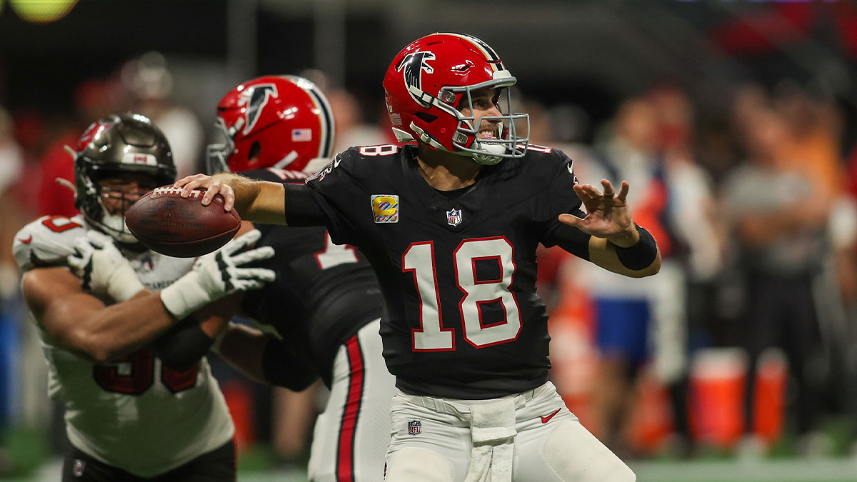 Atlanta Falcons quarterback Kirk Cousins (18) throws against the Tampa Bay Buccaneers in the second quarter at Mercedes-Benz Stadium.