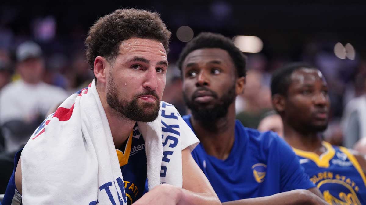 Golden State Warriors guard Klay Thompson (11) sits on the bench during action against the Sacramento Kings in the fourth quarter during a play-in game of the 2024 NBA playoffs at the Golden 1 Center.