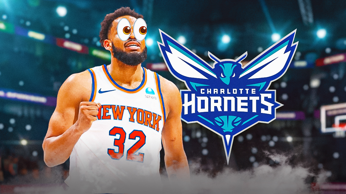 Karl-Anthony Towns in Knicks jersey looks at Hornets logo with bulging eyes