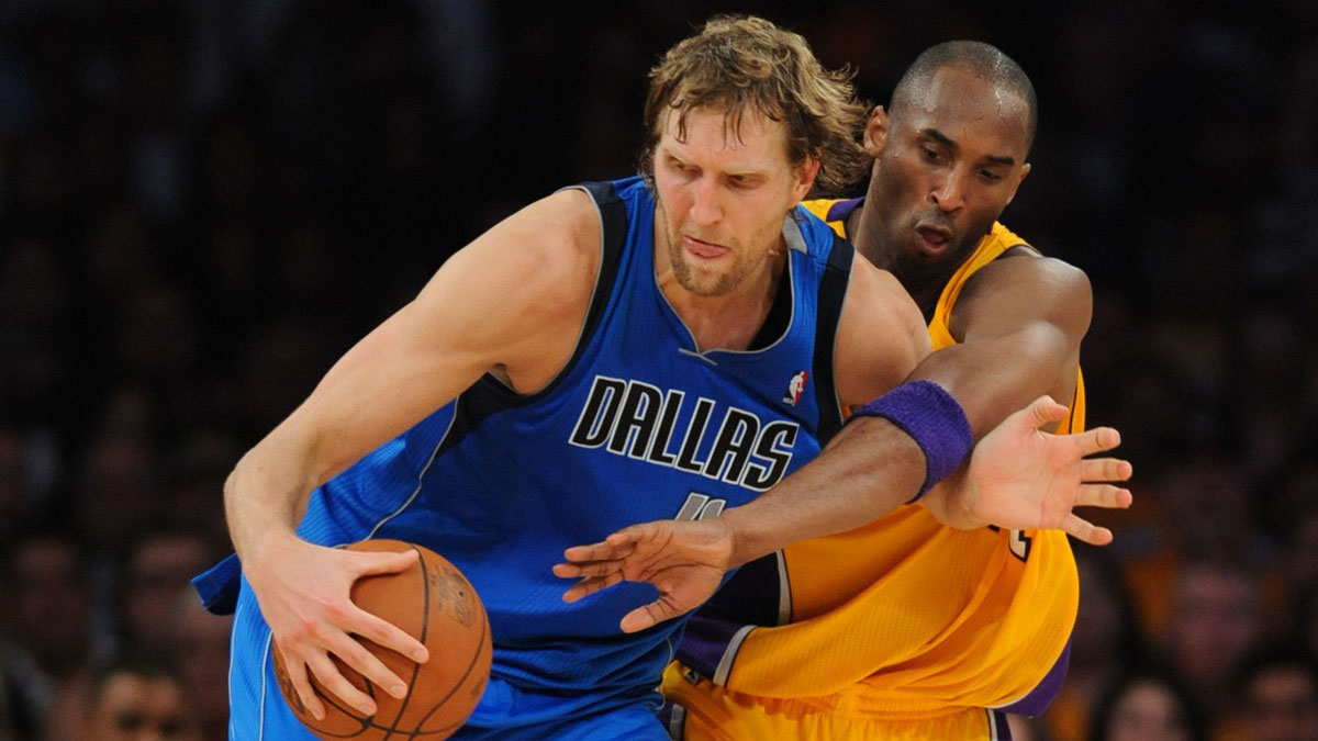 Los Angeles Lakers shooting guard Kobe Bryant (24) reaches in for the ball as Dallas Mavericks power forward Dirk Nowitzki (41) keeps control during the 4th quarter of game two of the second round of the 2011 NBA playoffs at the Staples Center. The Mavericks won 93-81.