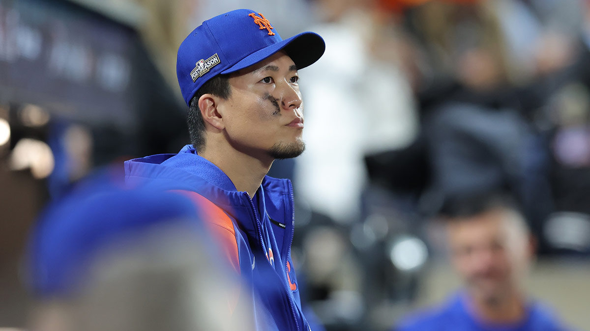 New York Mets pitcher Kodai Senga (34) looks out from the dugout against the Philadelphia Phillies in the eighth inning in game four of the NLDS for the 2024 MLB Playoffs at Citi Field.