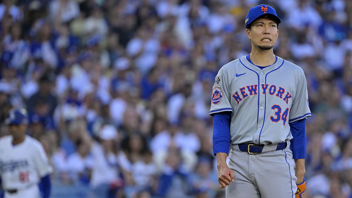 New York Mets pitcher Kodai Senga (34) reacts against the Los Angeles Dodgers during the first inning in game one of the NLCS for the 2024 MLB Playoffs at Dodger Stadium.