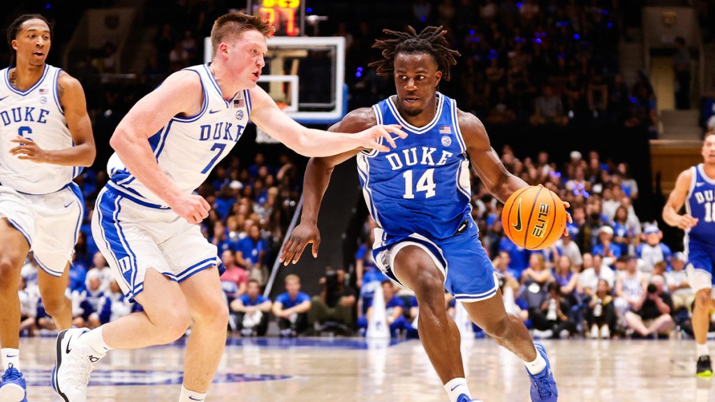 Duke Blue Devils guard Sion James (14) dribbles with the ball while guarded by guard Kon Knueppel (7) during Countdown to Craziness at Cameron Indoor Stadium.