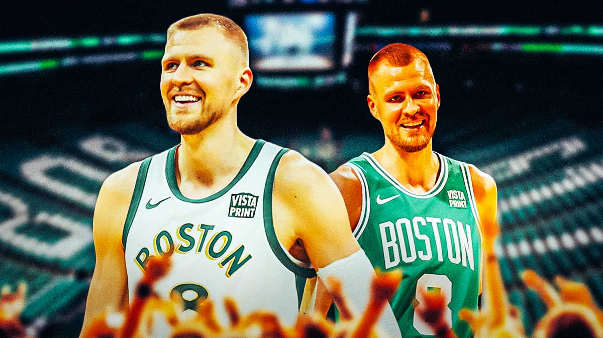 Kristaps Porzingis smiling on a Celtics background.