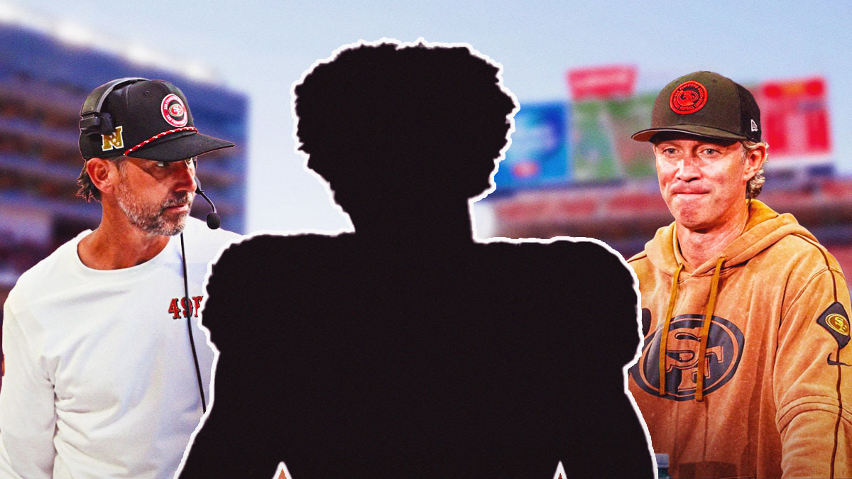 Kyle Shanahan on the left, Nick Sorensen on the right with the blacked-out silhouette of Malik Mustapha in the middle in front of the 49ers stadium