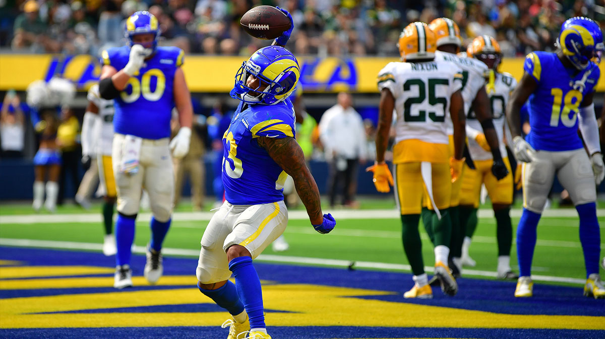Los Angeles Rams running back Kyren Williams (23) celebrates his touchdown scored agaisnt the Green Bay Packers during the first half at SoFi Stadium.