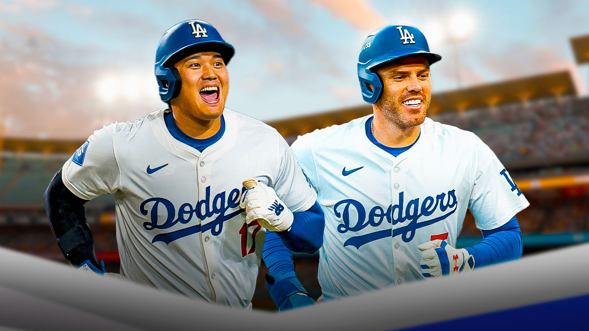 Shohei Ohtani and Freddie Freeman in Dodgers uniforms smiling and celebrating