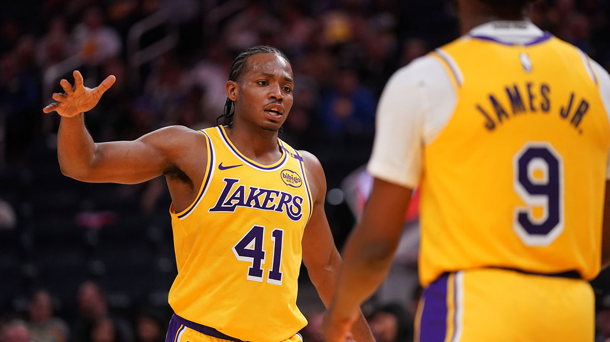 Los Angeles Lakers guard Quincy Olivari (41) gives a high five to guard Bronny James (9) after a play against the Golden State Warriors in the third quarter at the Chase Center