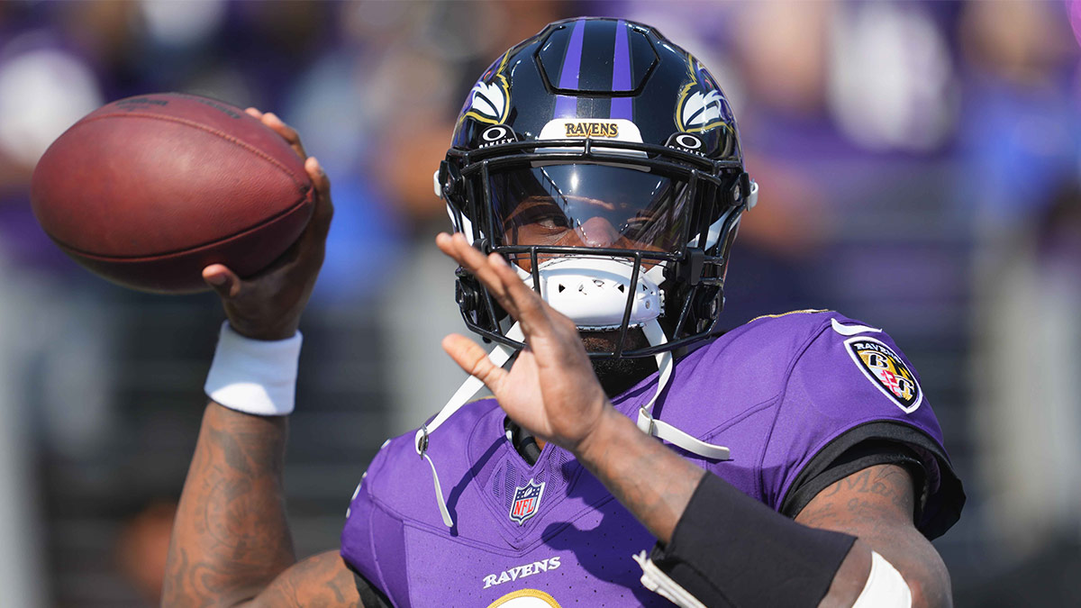 Baltimore Ravens quarterback Lamar Jackson (8) warms up prior to the game against the Washington Commanders at M&T Bank Stadium.