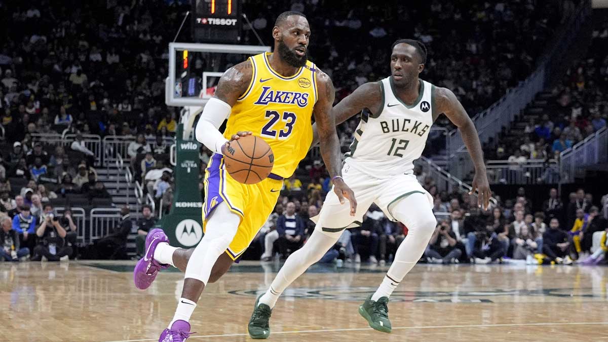 Los Angeles Lakers forward LeBron James (23) drives to the basket against Milwaukee Bucks forward Taurean Prince (12) in the first half at Fiserv Forum.