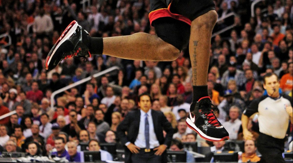 Miami Heat forward LeBron James (6) dunks the ball against the Phoenix Suns during the second quarter at the US Airways Center.
