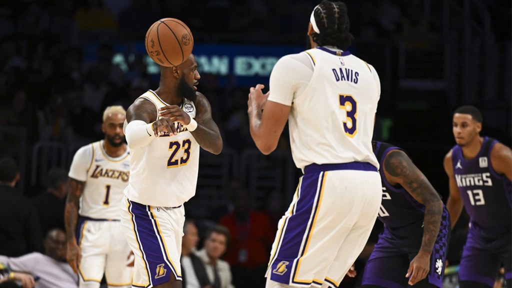 Los Angeles Lakers forward LeBron James (23) passes to Los Angeles Lakers forward Anthony Davis (3) during the first half at Crypto.com Arena.