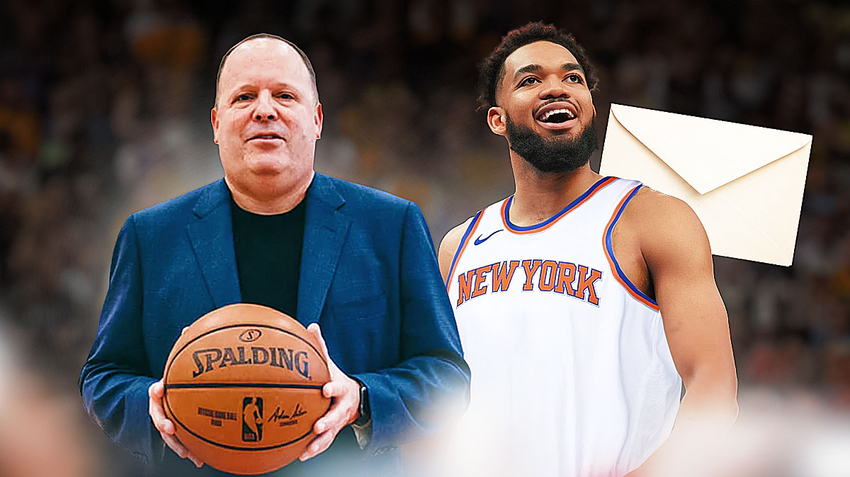 Knicks Leon Rose next to Karl-Anthony Towns with a letter next to him