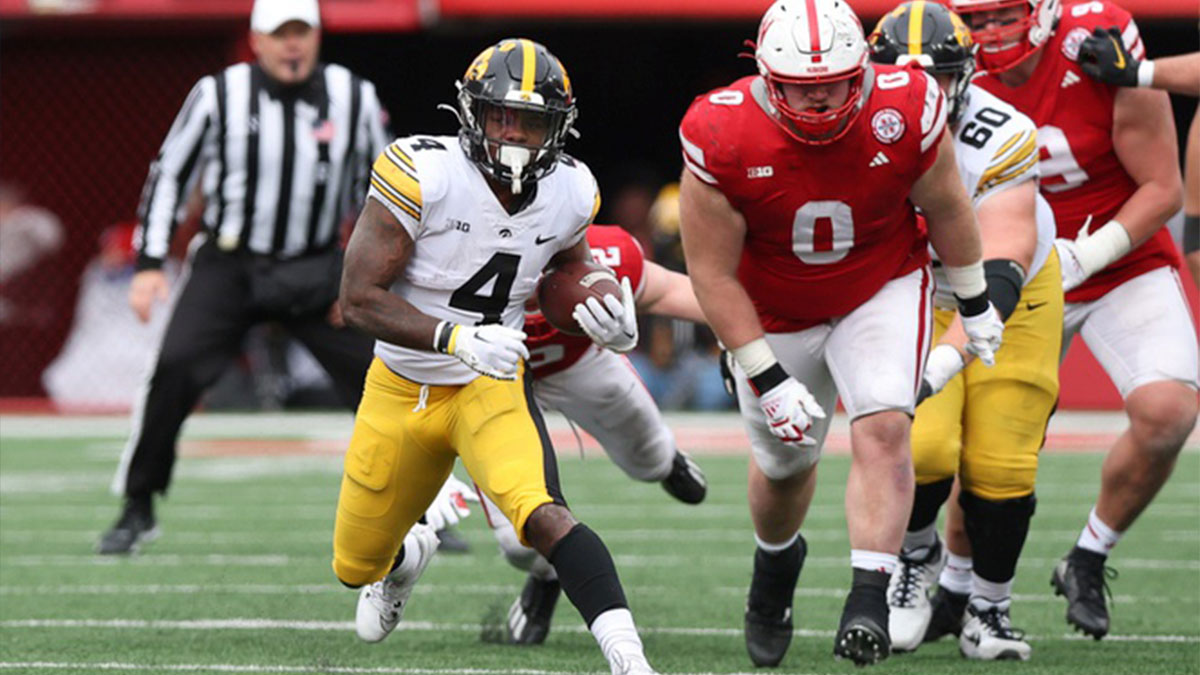Nov 24, 2023; Lincoln, Nebraska, USA; Iowa Hawkeyes running back Leshon Williams (4) runs the football against the Nebraska Cornhuskers at Memorial Stadium.