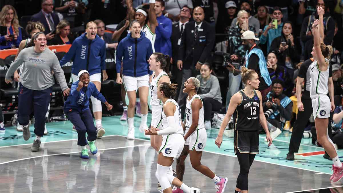 The Minnesota Lynx celebrate after defeating the New York Liberty in overtime at Barclays Center. 