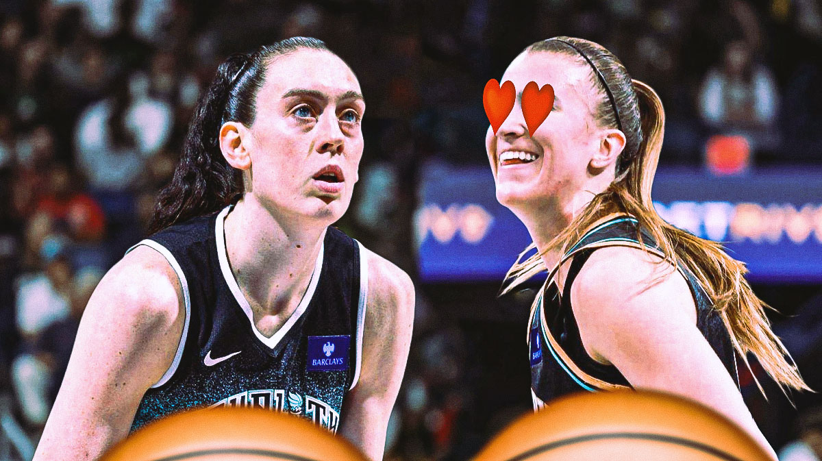 Sabrina Ionescu with heart eyes looking at Breanna Stewart