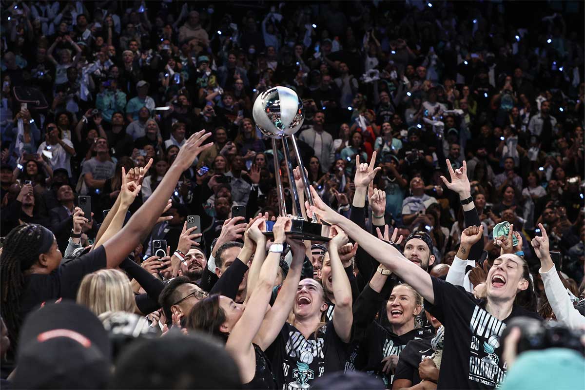 The New York Liberty celebrate after winning the 2024 WNBA Finals at Barclays Center.