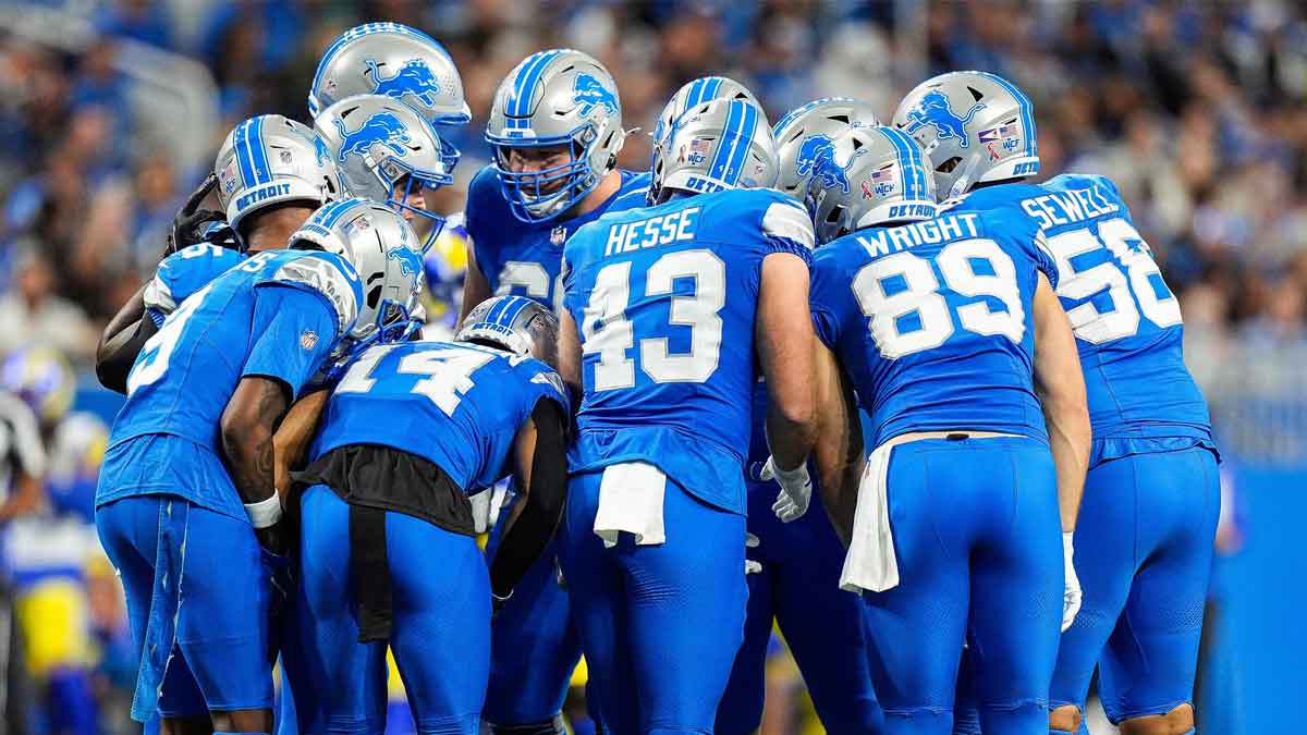 Detroit Lions offensive line huddle before a play against Los Angeles Rams during the first half at Ford Field in Detroit on Sunday, September 8, 2024.