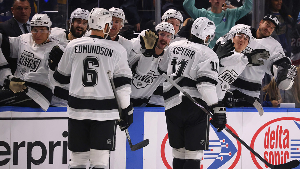 Los Angeles Kings center Anze Kopitar (11) celebrates his third goal of the game with teammates during the third period against the Buffalo Sabres at KeyBank Center.