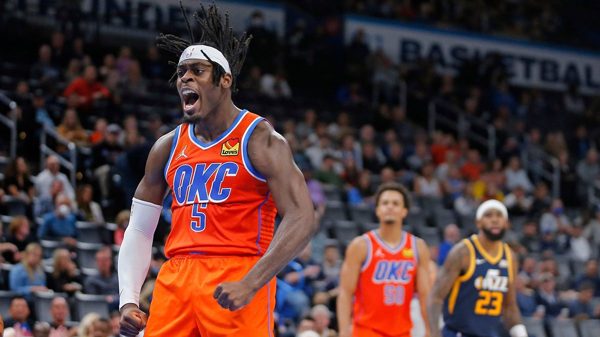 OKC's Lu Dort (5) celebrates after a basket against Utah on Nov. 24 at Paycom Center.
