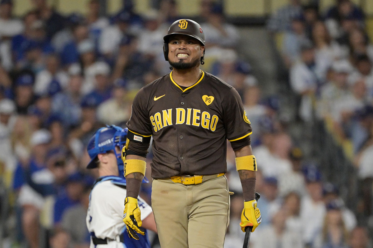 San Diego Padres first baseman Luis Arraez (4) reacts at bat in the sixth inning against the Los Angeles Dodgers during game five of the NLDS for the 2024 MLB Playoffs at Dodger Stadium.