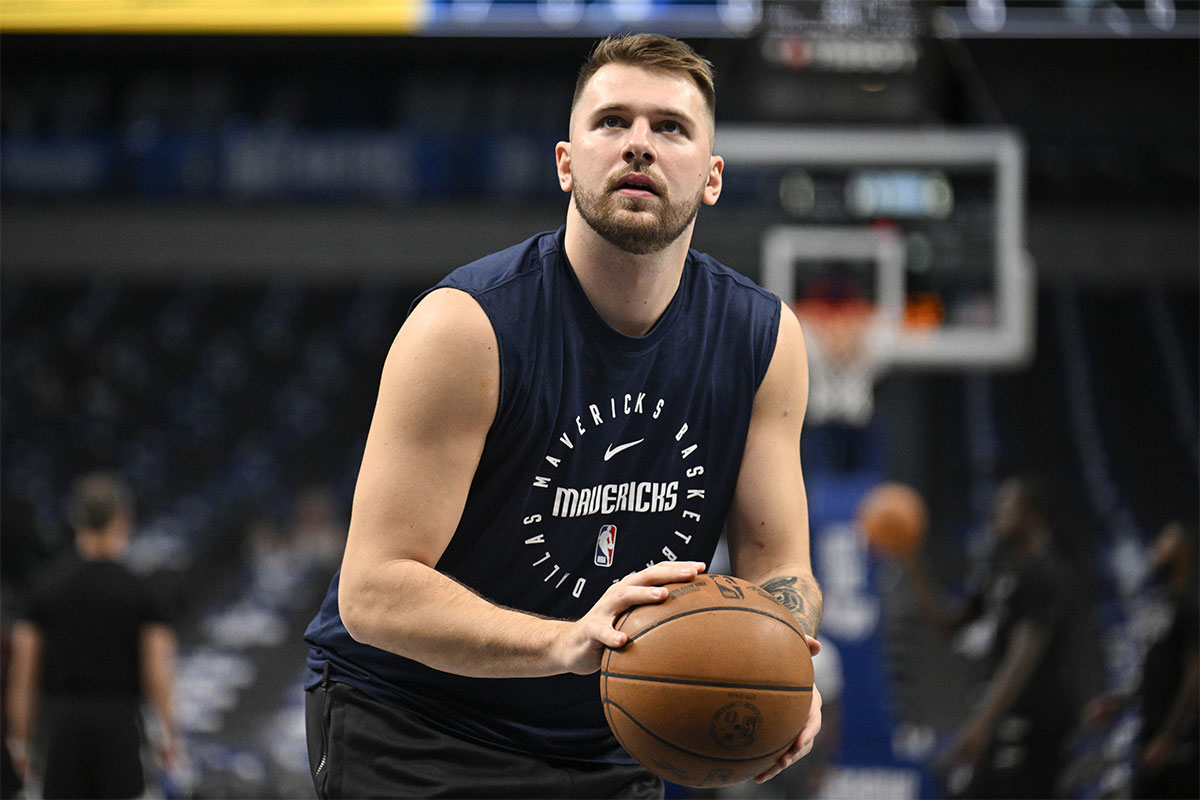 Dallas Mavericks guard Luka Doncic (77) warms up before the game between the Dallas Mavericks and the San Antonio Spurs at the American Airlines Center.