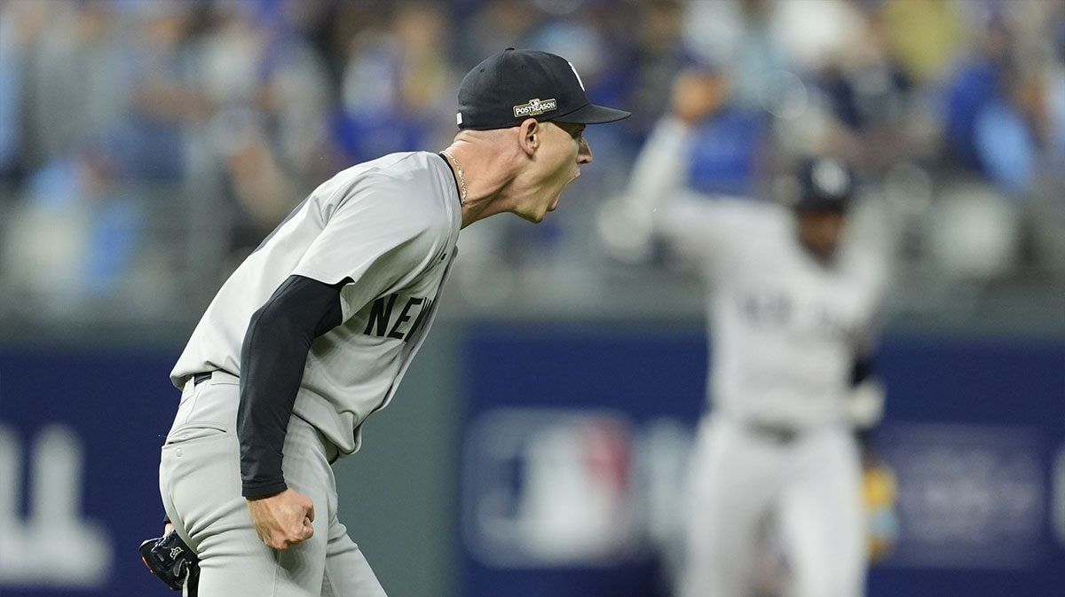 New York Yankees pitcher Luke Weaver (30) celebrates a win over the Kansas City Royals during game four of the ALDS for the 2024 MLB Playoffs at Kauffman Stadium.