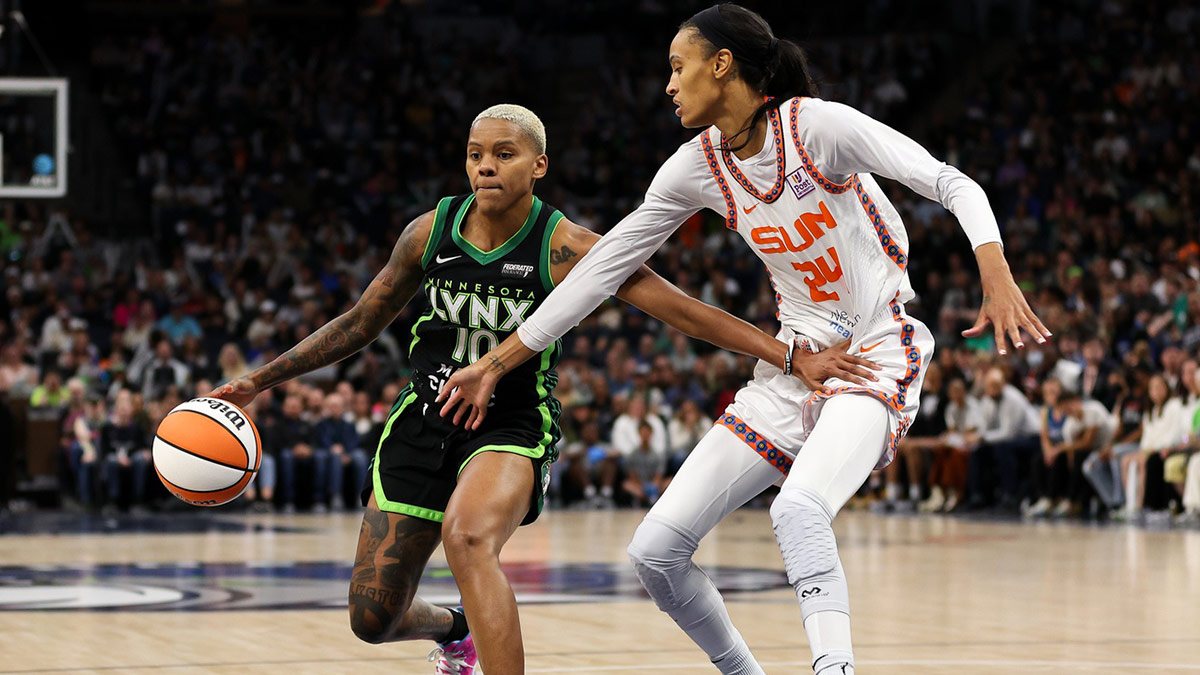Minnesota Lynx guard Courtney Williams (10) works around Connecticut Sun forward DeWanna Bonner (24) during the first half of game five of the 2024 WNBA playoffs