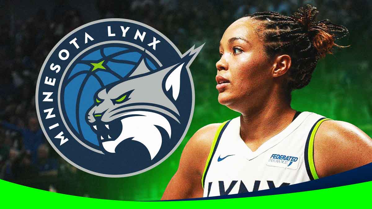 Napheesa Collier looking at the Minnesota Lynx logo