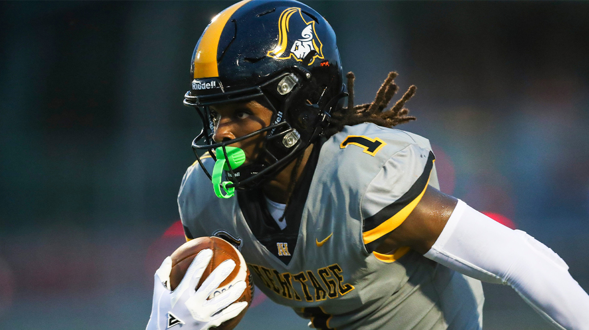 American Heritage Patriots receiver Malachi Toney (1) runs the ball during the first quarter of a game against the Naples Golden Eagles.