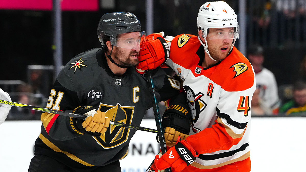 Anaheim Ducks defenseman Cam Fowler (4) jostles with Vegas Golden Knights right wing Mark Stone (61) for position during the second period at T-Mobile Arena.