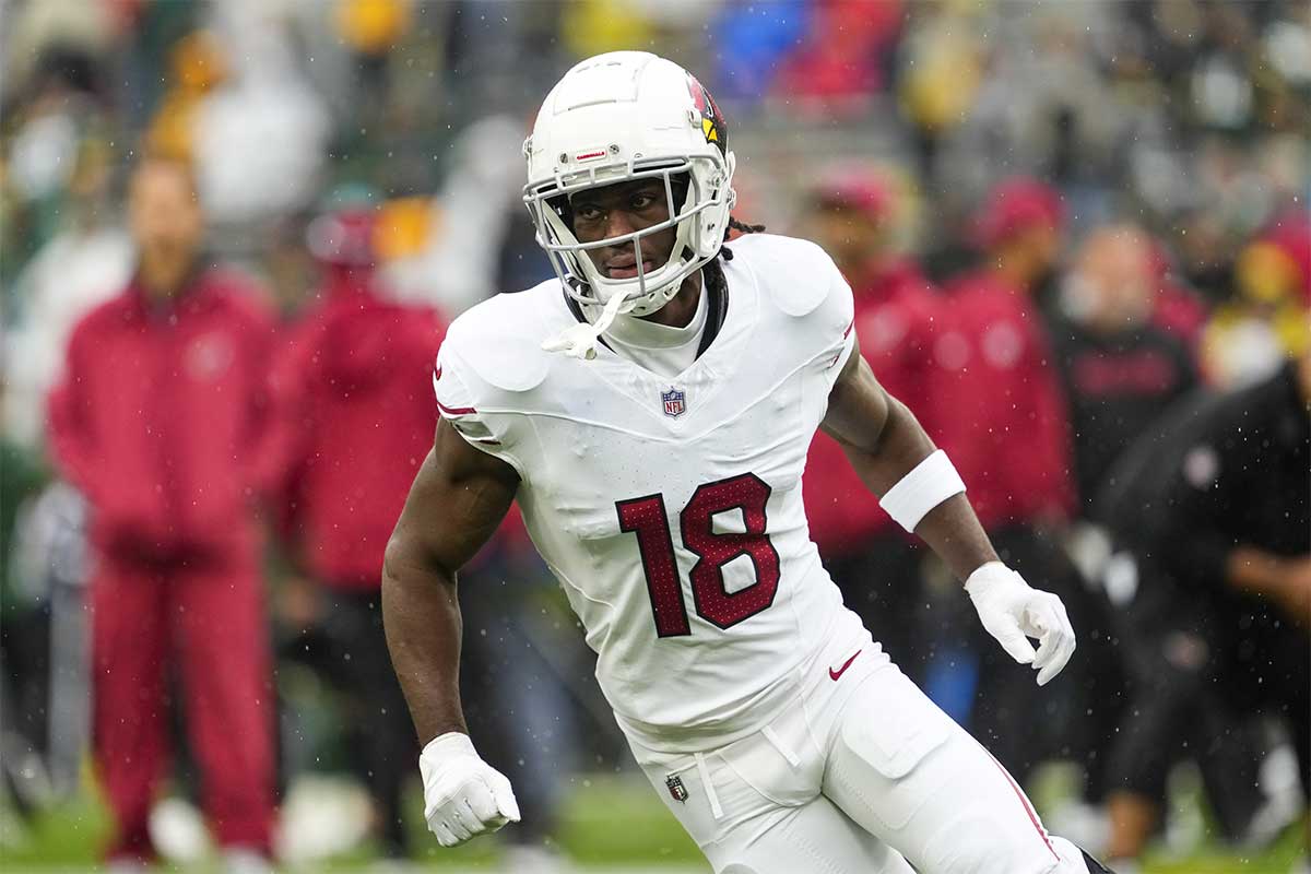 Arizona Cardinals wide receiver Marvin Harrison Jr. (18) during warmups prior to the game against the Green Bay Packers at Lambeau Field.