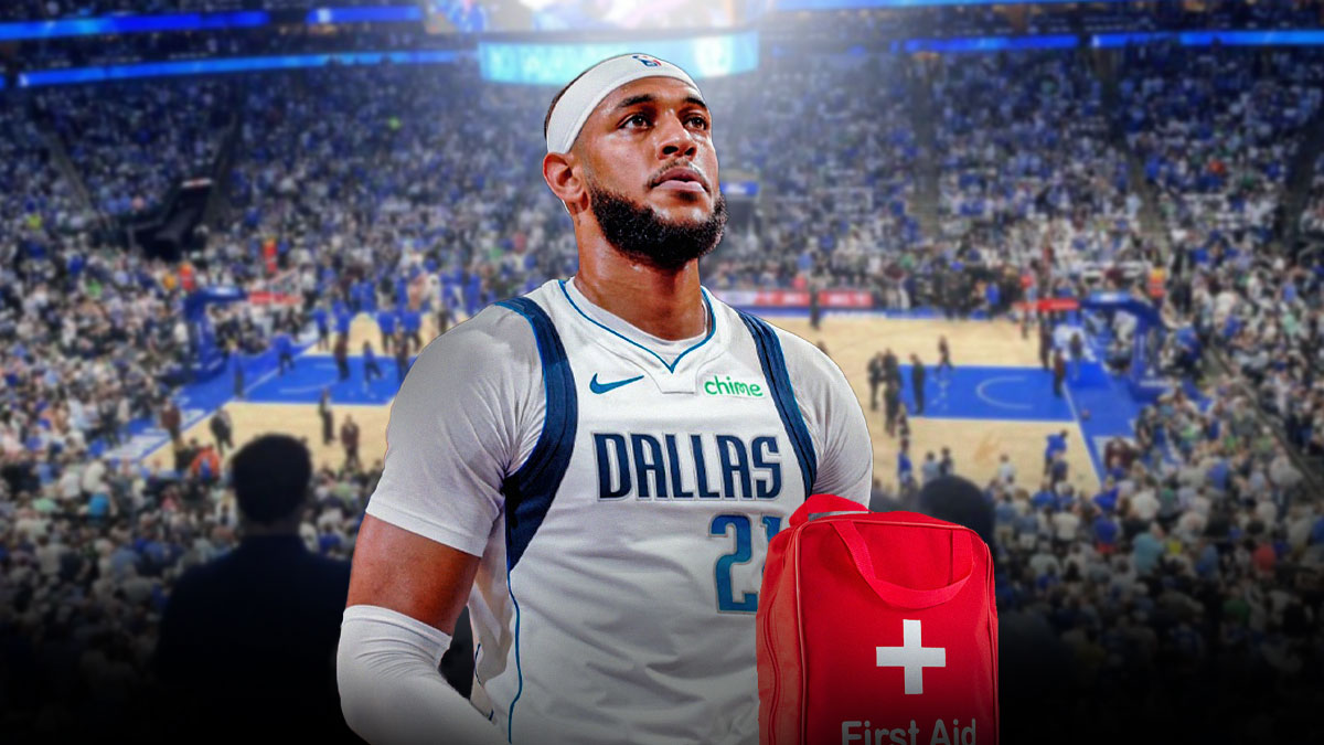 Mavericks' Daniel Gafford with a medical kit