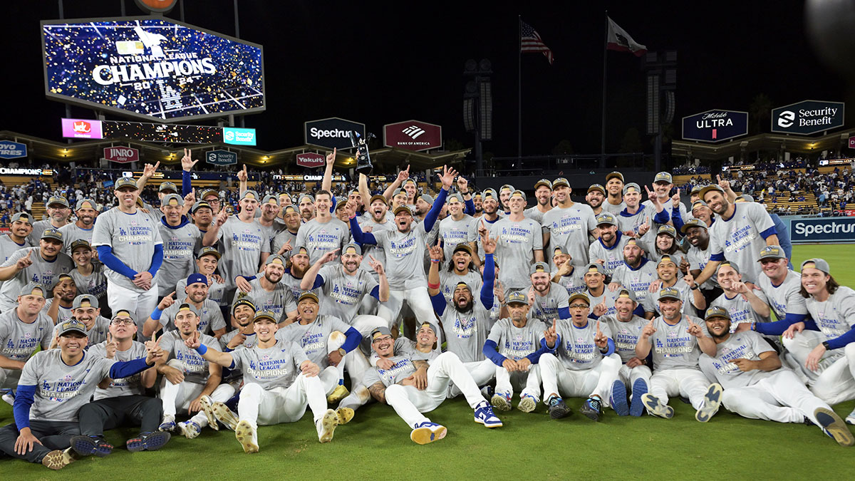 The Los Angeles Dodgers celebrate on the field after defeating the New York Mets in game six of the NLCS for the 2024 MLB playoffs to advance to the World Series at Dodger Stadium.