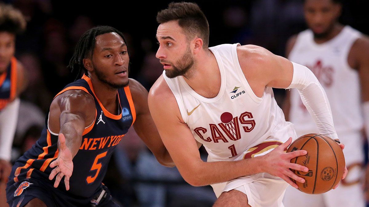 Cleveland Cavaliers guard Max Strus (1) controls the ball against New York Knicks guard Immanuel Quickley (5) during the fourth quarter at Madison Square Garden.