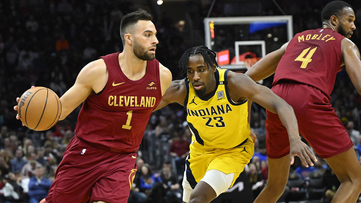 Indiana Pacers forward Aaron Nesmith (23) defends Cleveland Cavaliers guard Max Strus (1) in the second quarter at Rocket Mortgage FieldHouse.