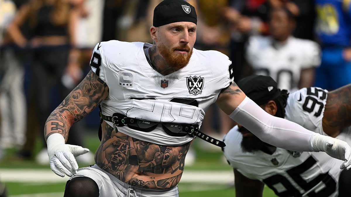 Las Vegas Raiders defensive end Maxx Crosby (98) stretches during pregame warmups before an NFL game against the Los Angeles Rams at SoFi Stadium.