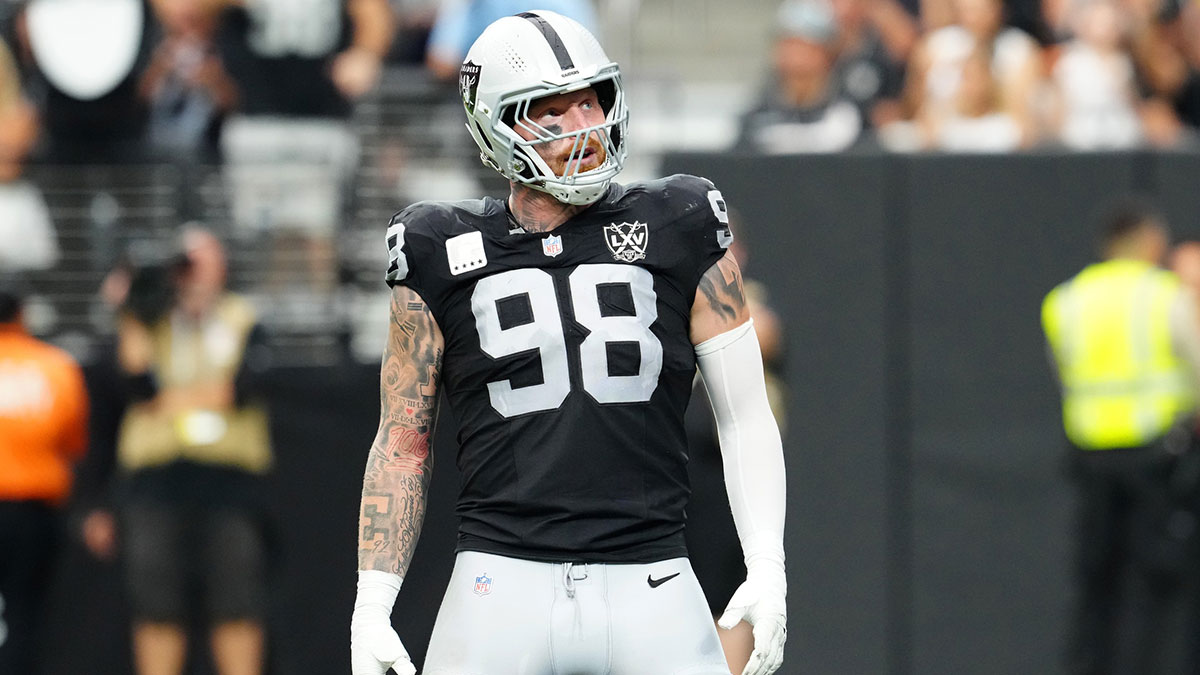 Las Vegas Raiders defensive end Maxx Crosby (98) celebrates after getting a sack against the Carolina Panthers during the second quarter at Allegiant Stadium.