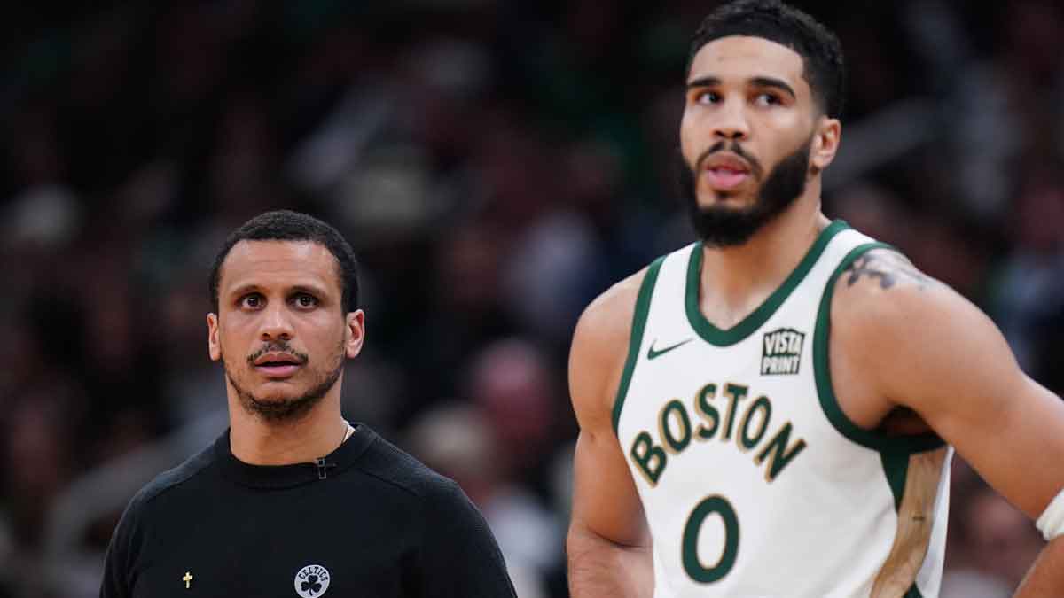 Boston Celtics head coach Joe Mazzulla with forward Jayson Tatum (0) look on from the sideline as they take on the Denver Nuggets at TD Garden.