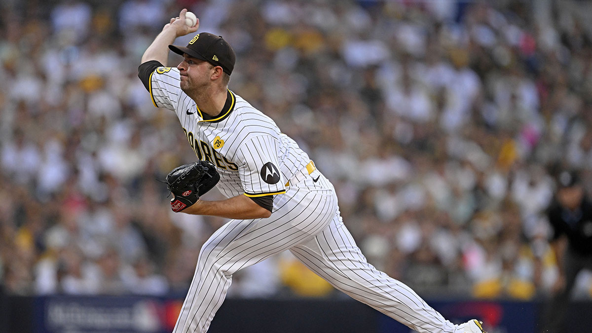 Oct 1, 2024; San Diego, California, USA; San Diego Padres pitcher Michael King (34) throws a pitch against the Atlanta Braves during the first inning in game one of the Wildcard round for the 2024 MLB Playoffs at Petco Park.
