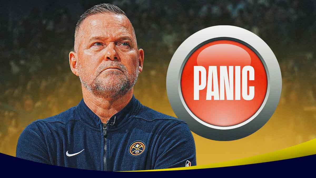 Thumbnail: Michael Malone next to a panic button (a button that has the word panic on it.)