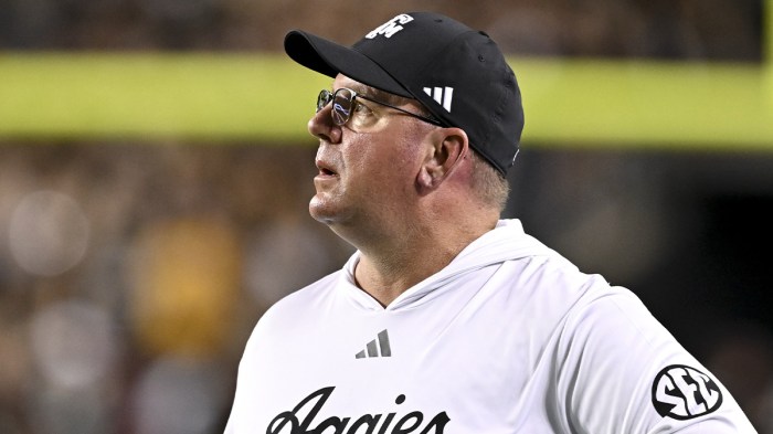 exas A&M Aggies head coach Mike Elko watches the replay in the third quarter against the LSU Tigers at Kyle Field.